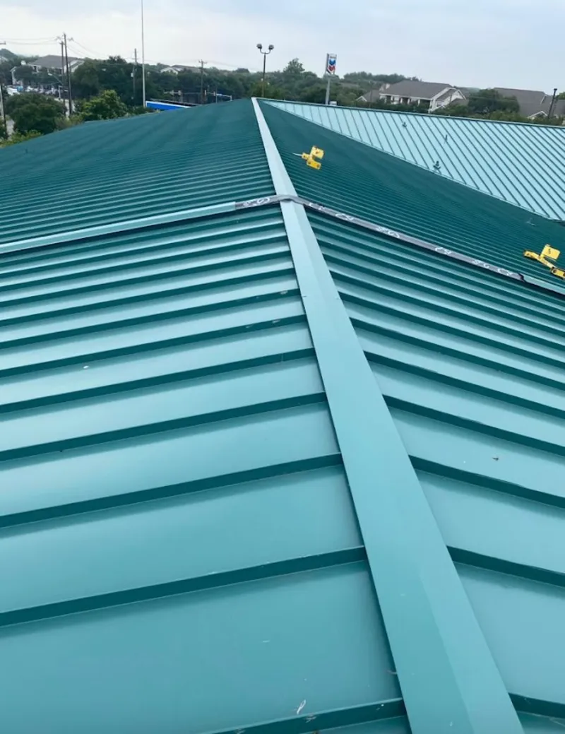 Green commercial metal roof ridge and valley for Metal Roof Repair in Gautier