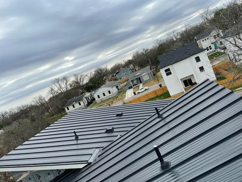 Standing seam metal roof panels with vents for Skylight Repair in Gautier